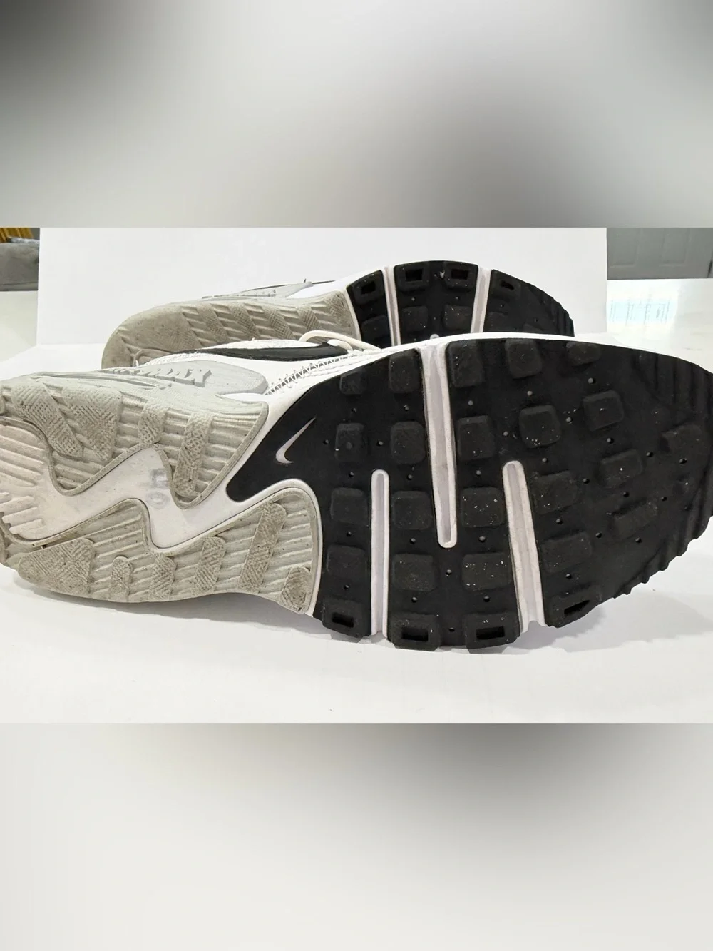 Nike White Sneakers with Black Swoosh